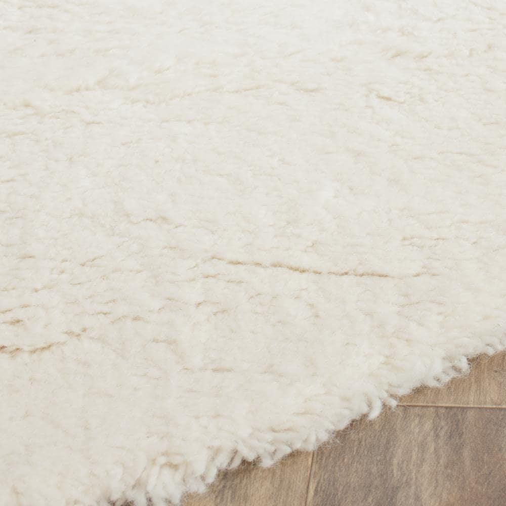 Flokati FLK150 Hand Tufted Round Area Rug - Ivory - 6' Round Safavieh.