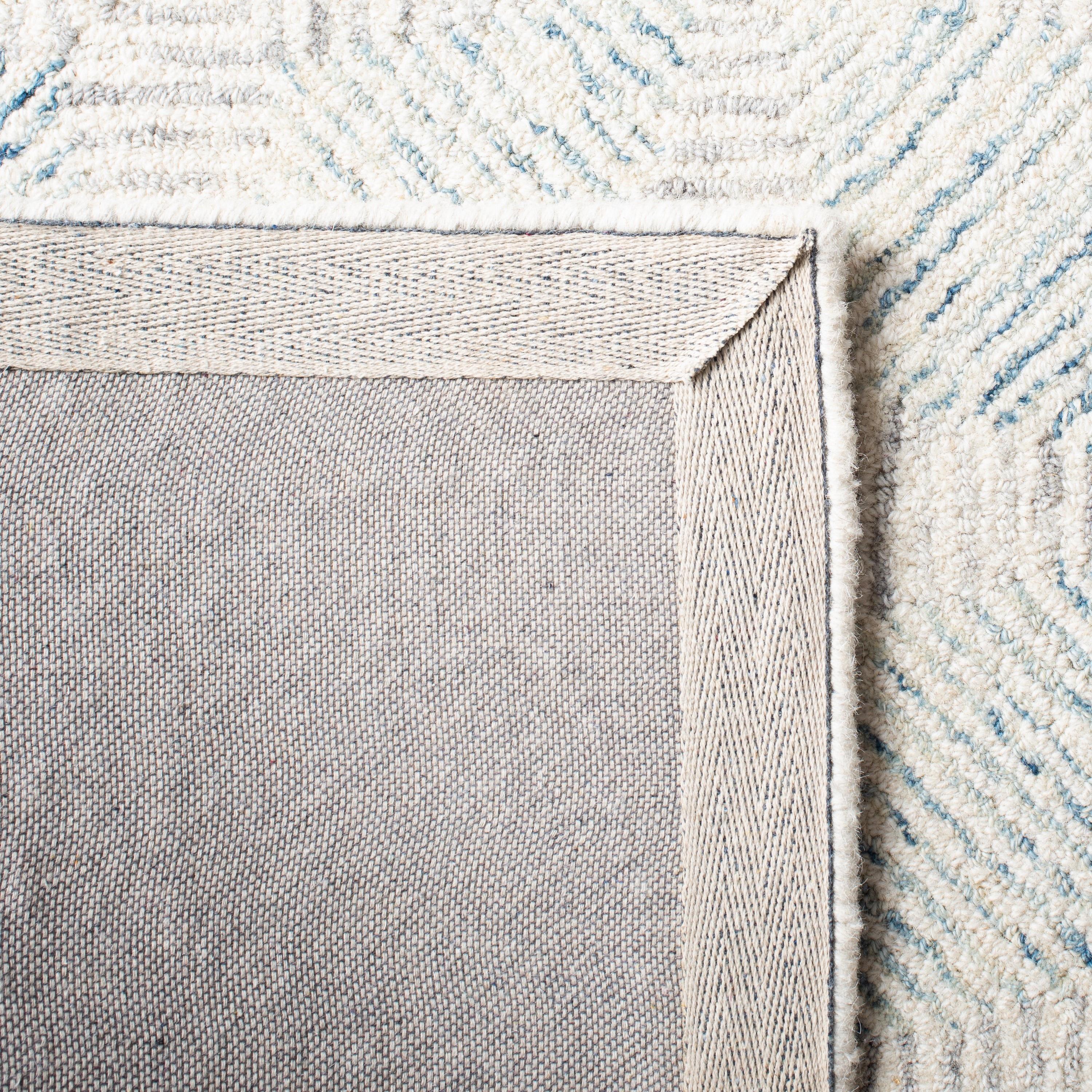 SAFAVIEH Abstract Qendro Geometric Area Rug, Ivory/Light Blue, 4' x 6'