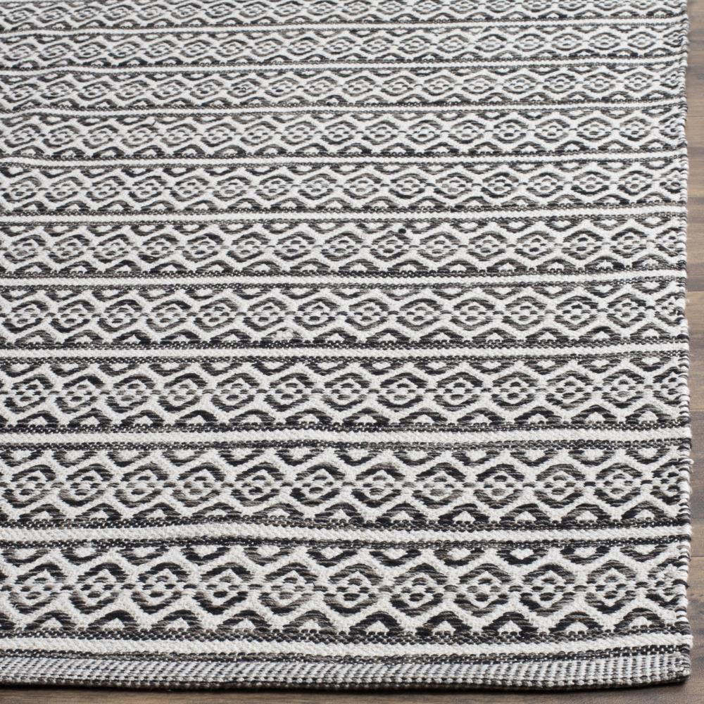 Montauk MTK341 Hand Woven Area Rug - Ivory/Black - 8'9"x11'9" - Safavieh.