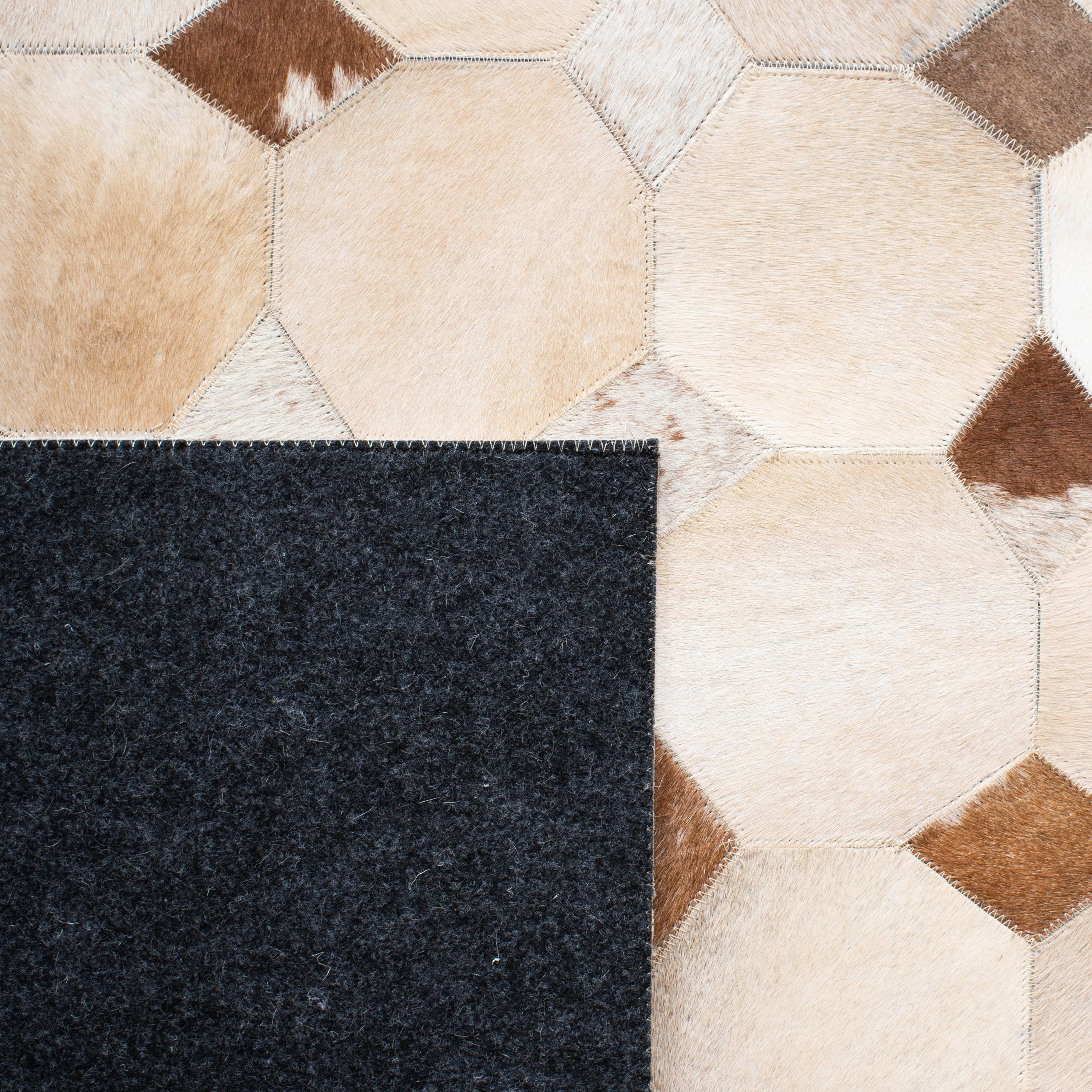 Loon Peak® Bersa Flat Weave Hair On Leather Geometric Rug