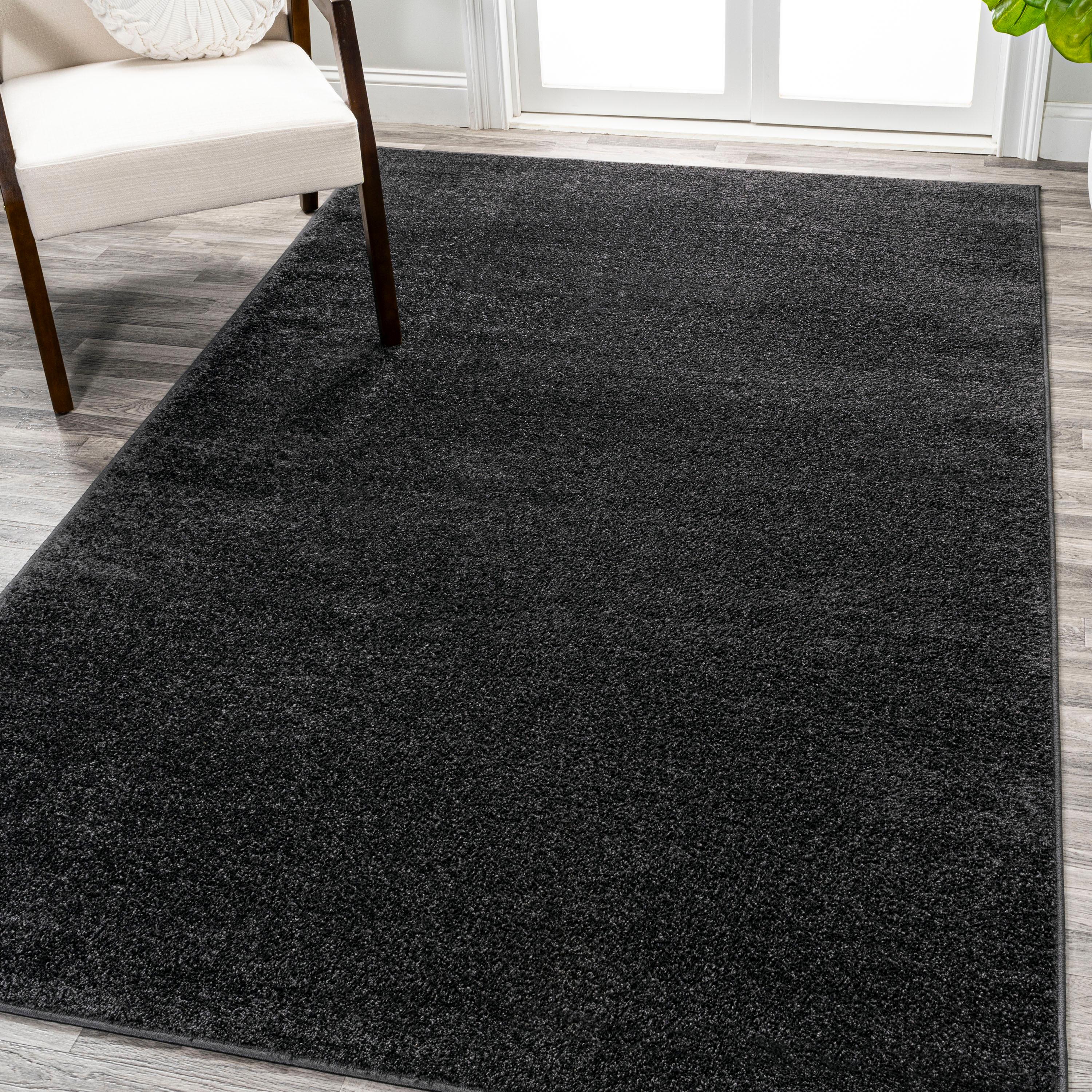 9' x 12' Haze Solid Low-Pile Area Rug, Black - JONATHAN Y