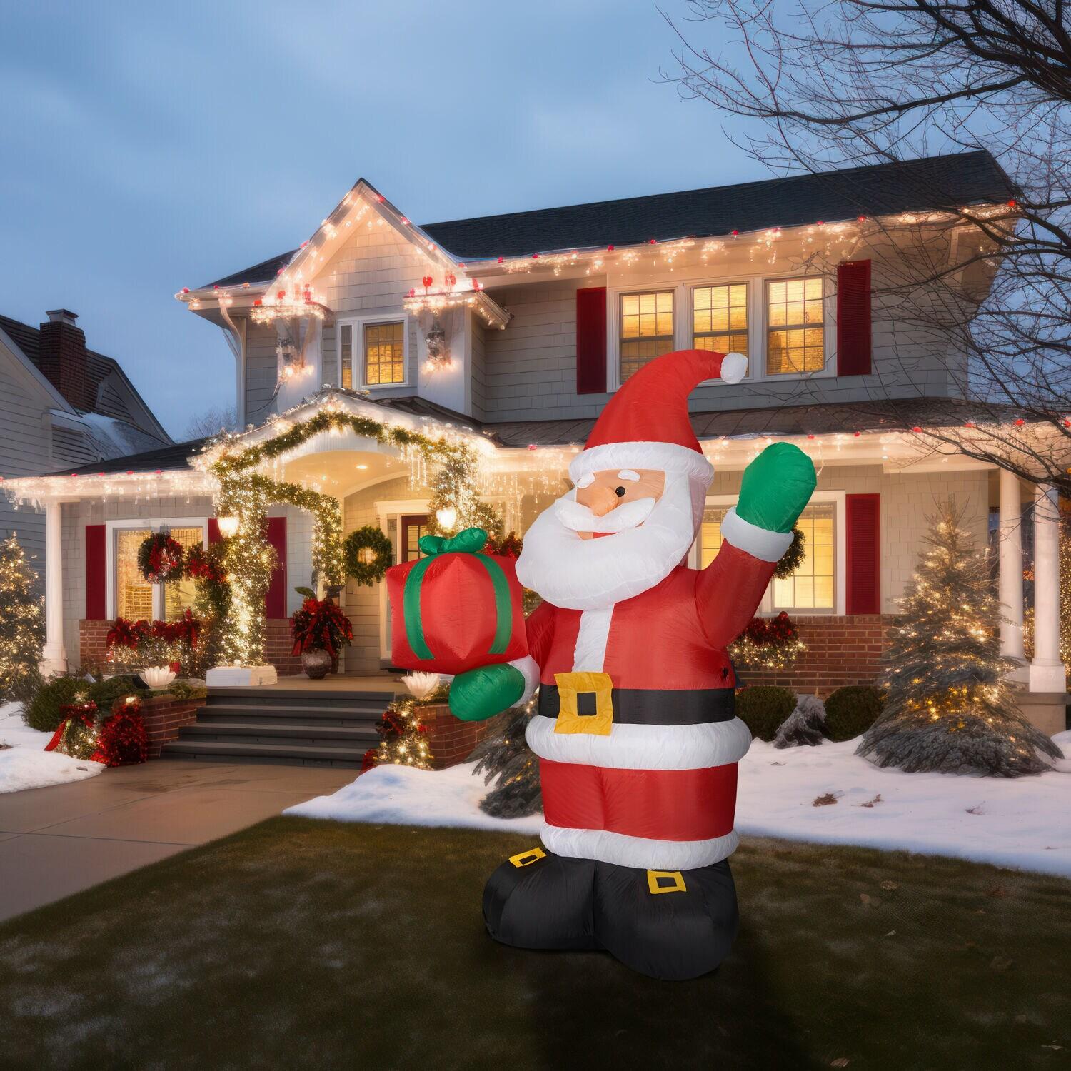 Fraser Hill Farm 10-Ft. Tall Pre-Lit Christmas Inflatable | Santa Claus Holding Gift with Lights and Storage Bag | Outdoor Holiday Blow-Up Festive Celebration Party Decor | FHFSANTA102-L