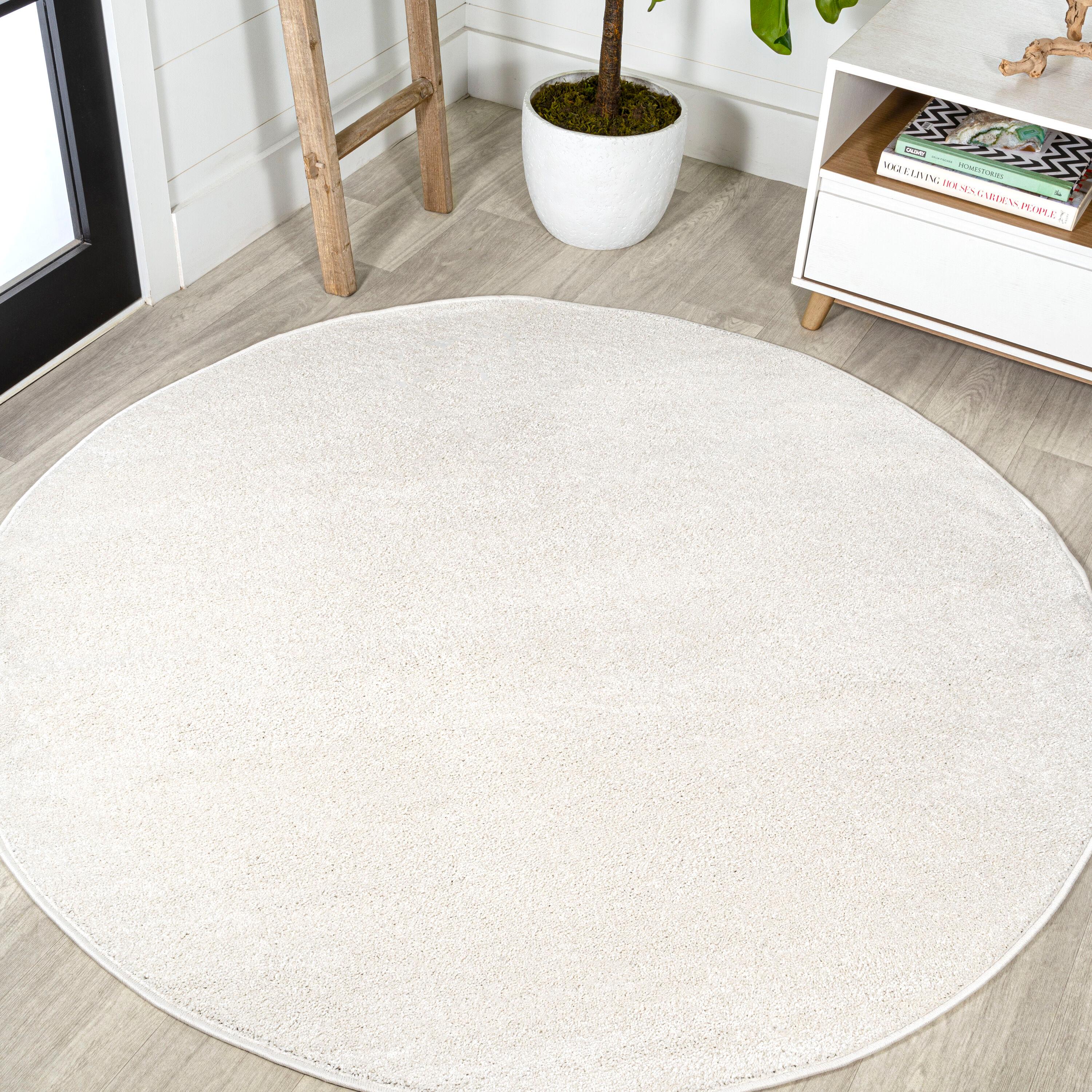 4' Round Round Haze Solid Low-Pile Area Rug , Cream - JONATHAN Y