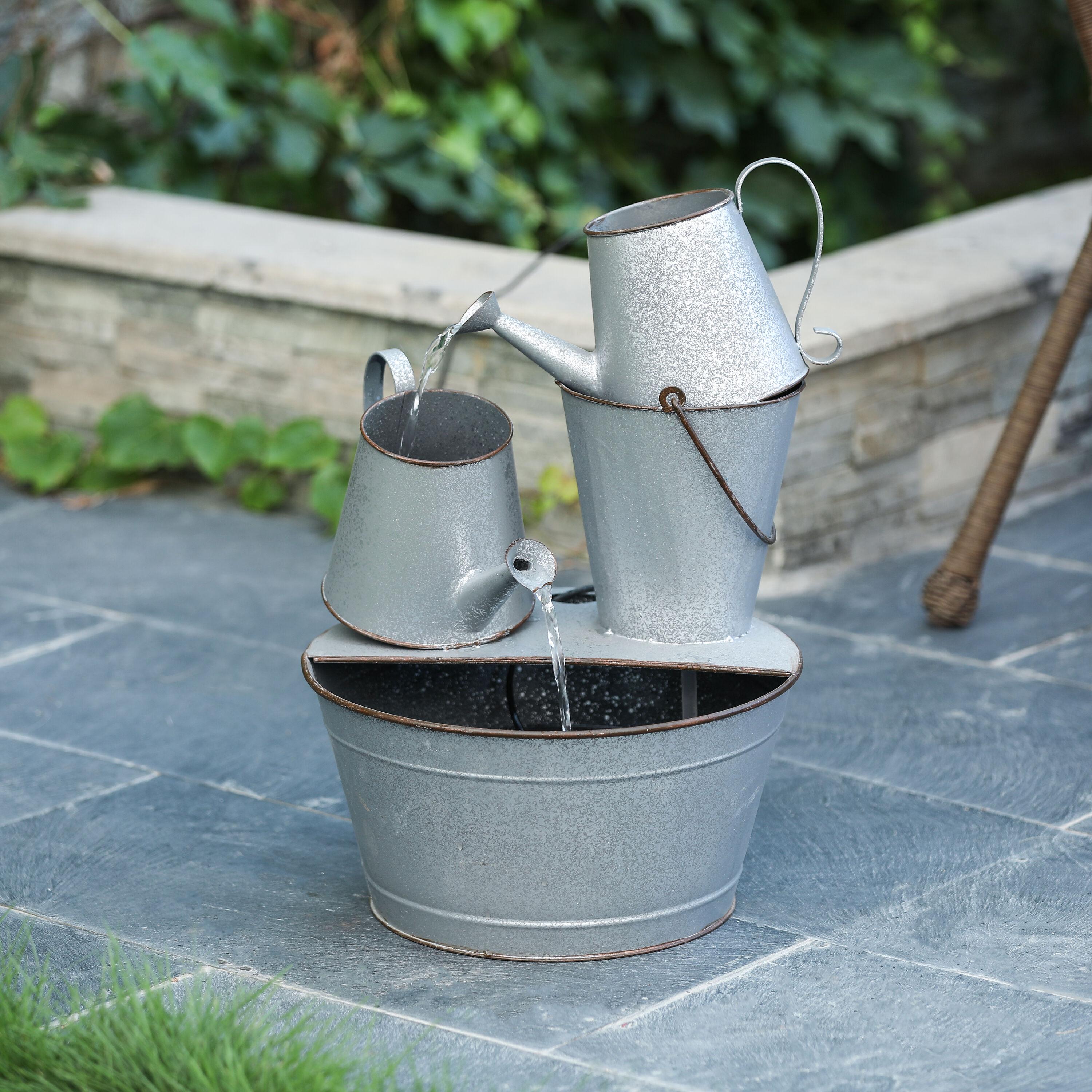 LuxenHome Farmhouse Rustic Metal Pitcher Outdoor Fountain Silver