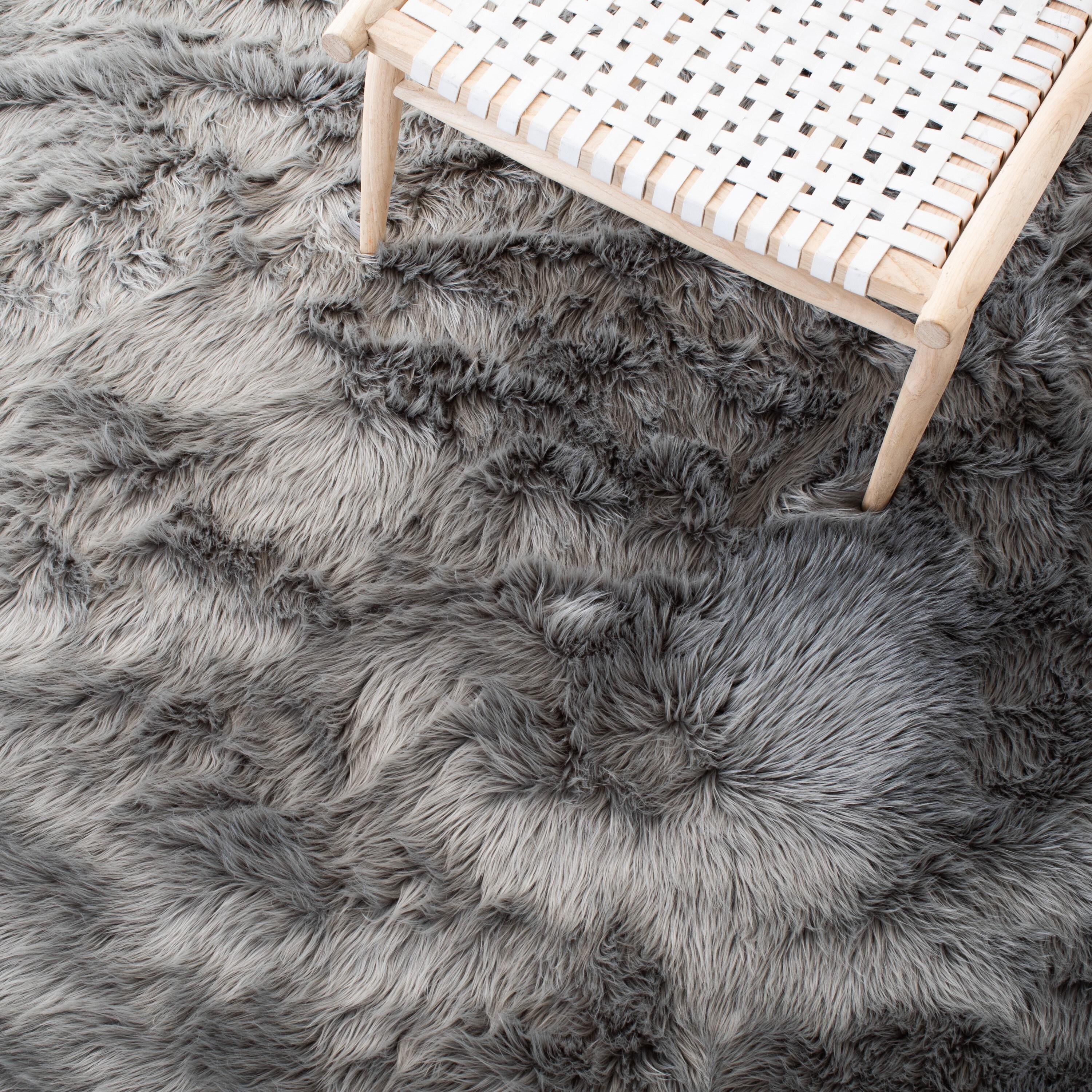 SAFAVIEH Faux Sheep Skin Vesna Solid Area Rug, Grey, 2' x 3'