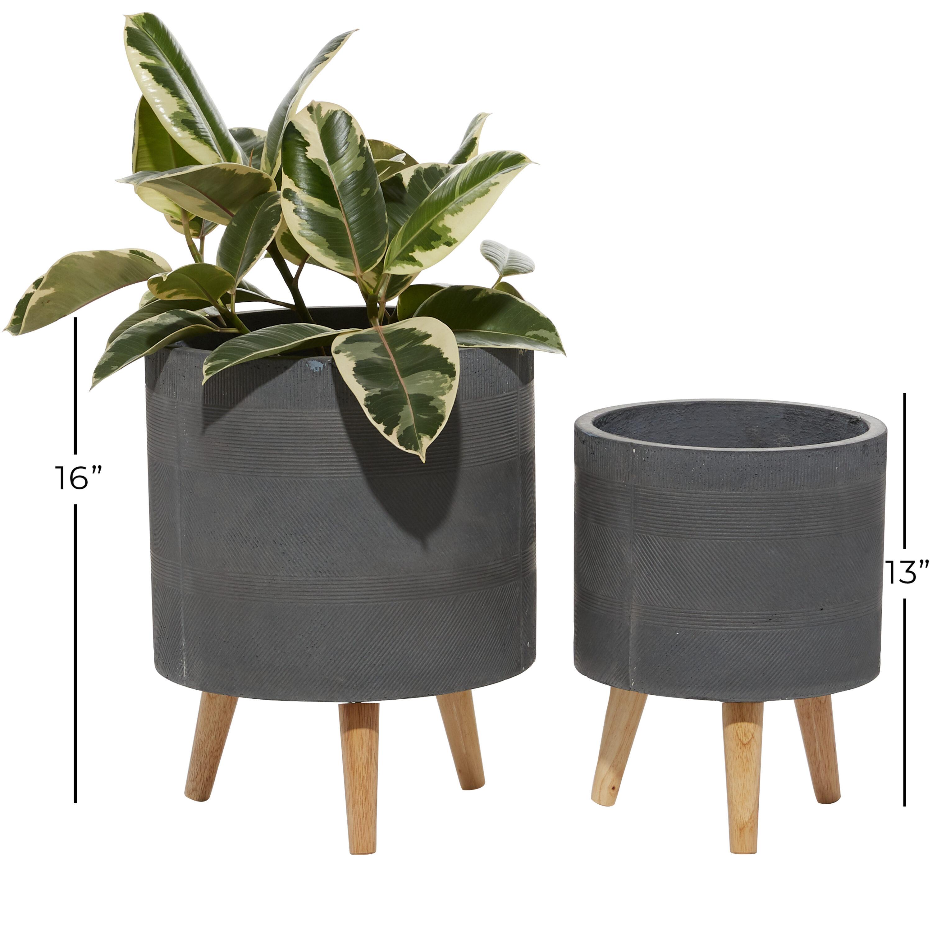 DecMode 13", 16"H Indoor Outdoor Gray Ceramic Planter with Wood Legs (2 Count)