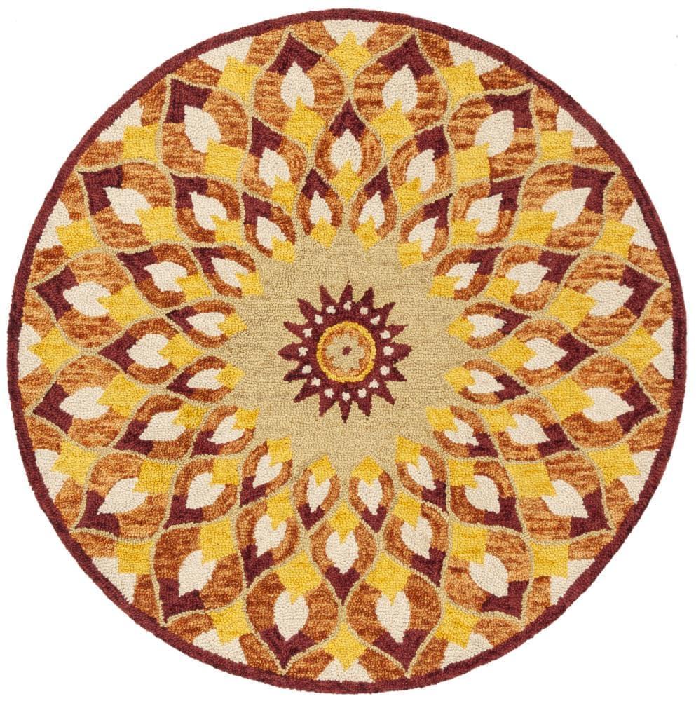 Novelty NOV603 Hand Tufted Area Rug - Rust/Gold - 5' round - Safavieh.