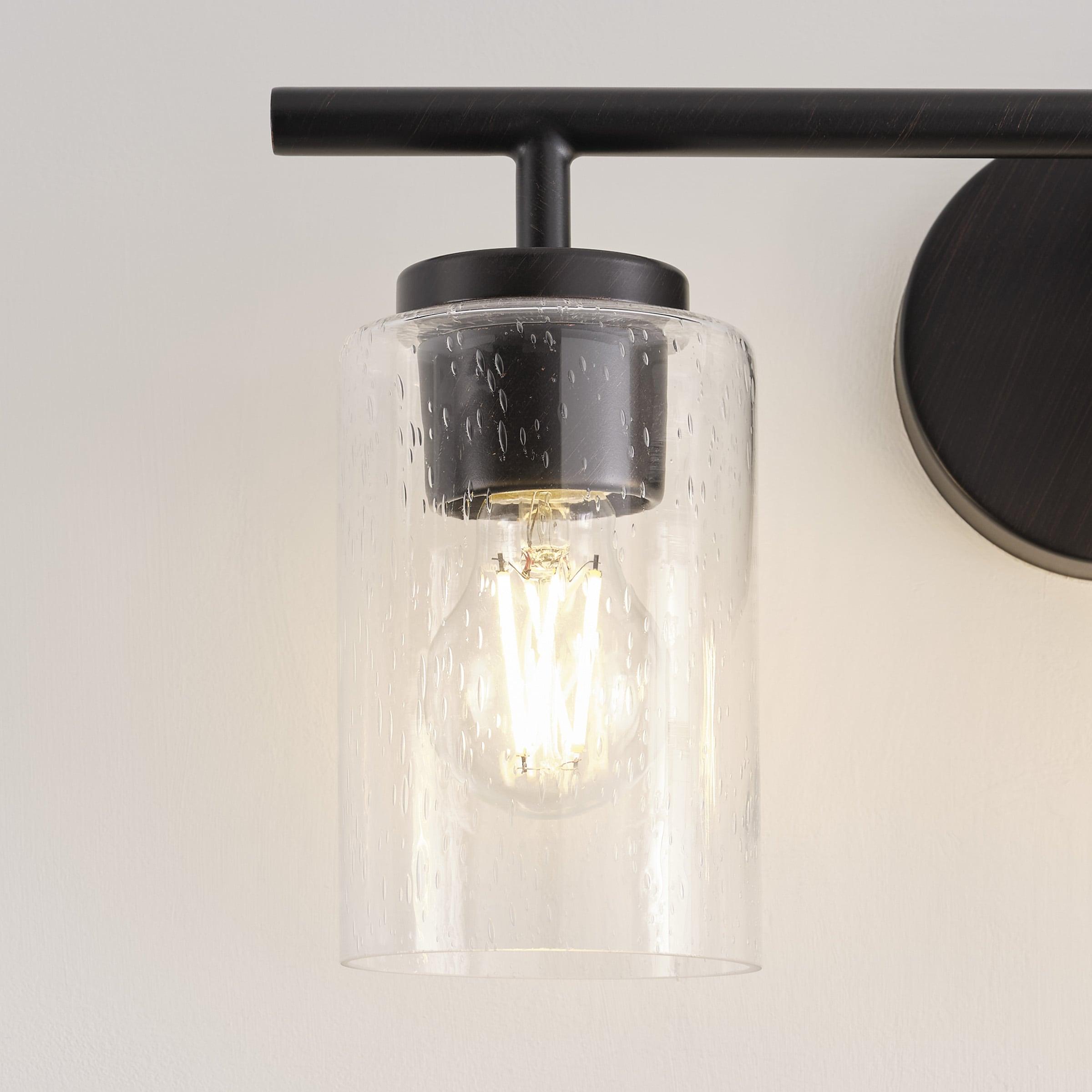 Oslo Bronze 3-Light Vanity Fixture with Clear Seeded Glass