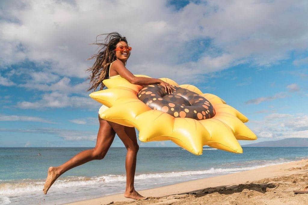 Get Ready for Summer Fun with PoolCandy's Inflatable Sunflower Island Pool Float - Perfect for Parties and Relaxation. The Ultimate Swimming Pool Inflatable Toy.