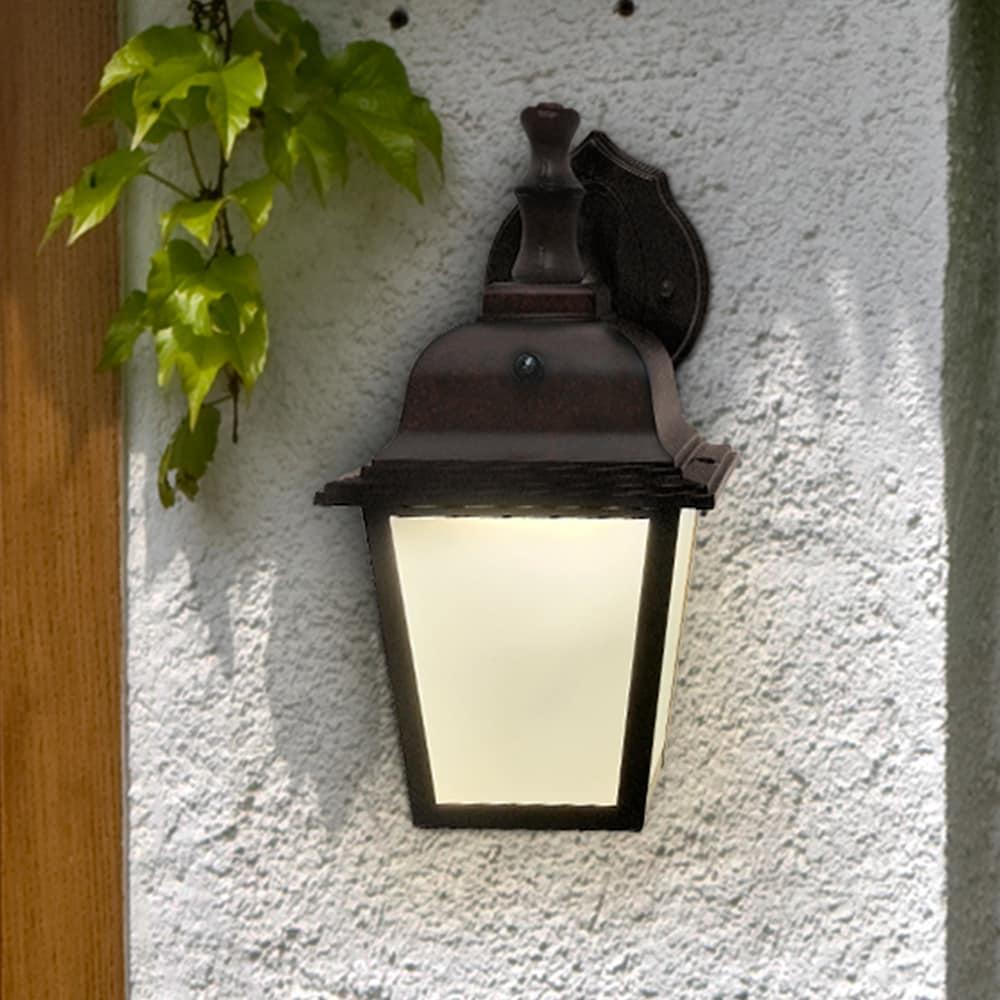 Maxxima LED Porch Lantern Outdoor Wall Light, Aged Bronze w/ Frosted Glass, Dusk to Dawn Sensor, 3000K