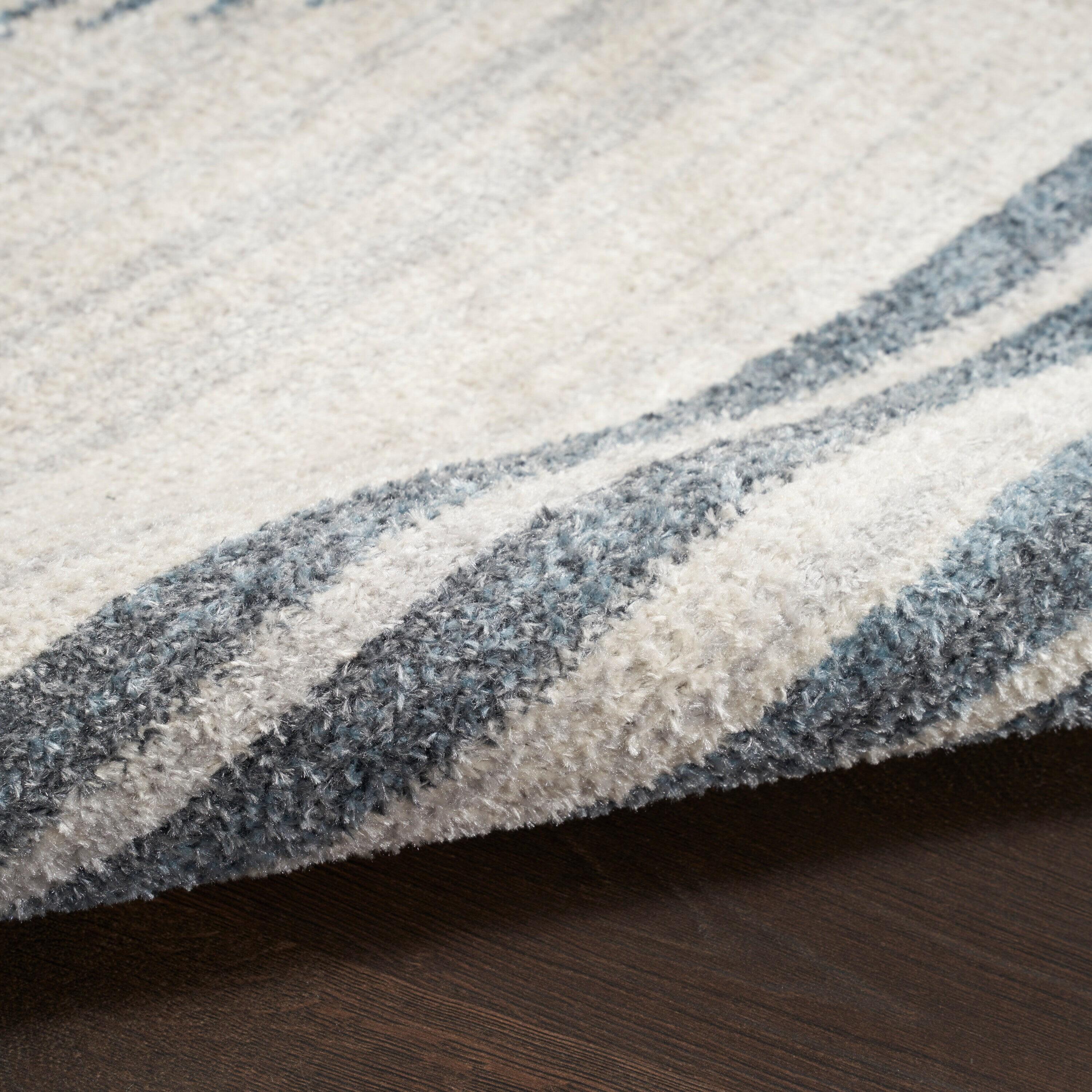 Nourison Astra Machine Washable Stripe Circle Mid-Century Modern Indoor Rug Ivory Blue 5'3" x 7'