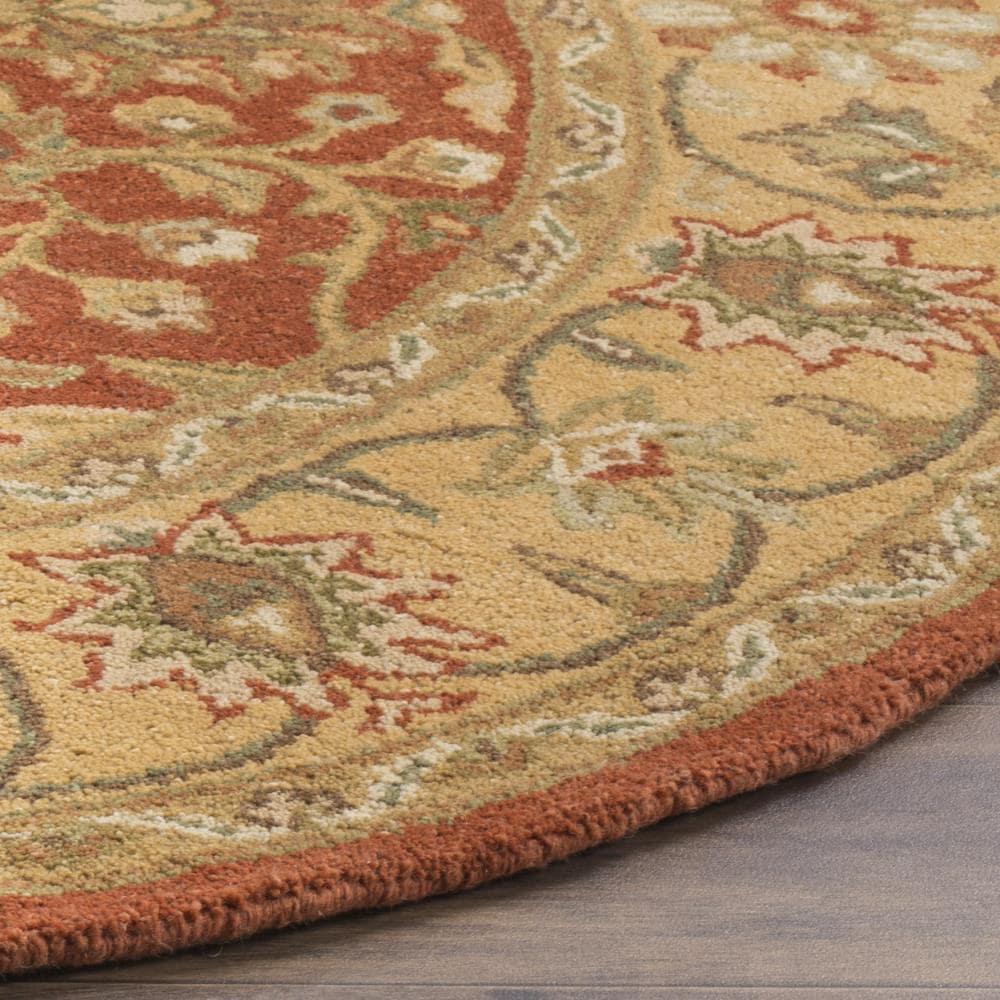 Antiquity AT249 Hand Tufted Area Rug - Rust/Gold - 6' Round - Safavieh.