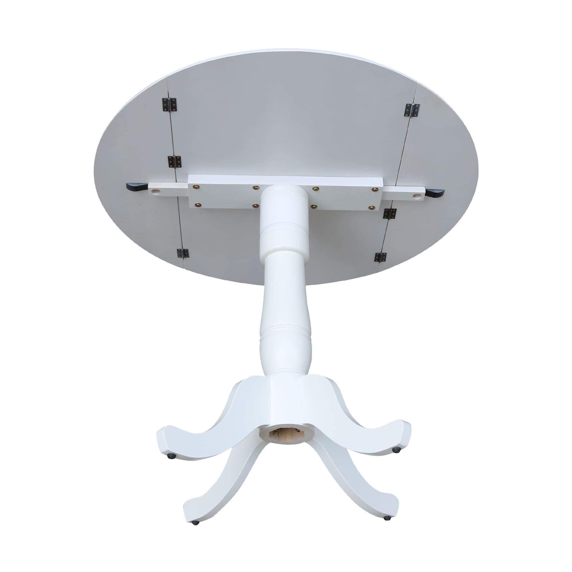 International Concepts 42 In Round dual drop Leaf Pedestal Table - 35.5  inchesH