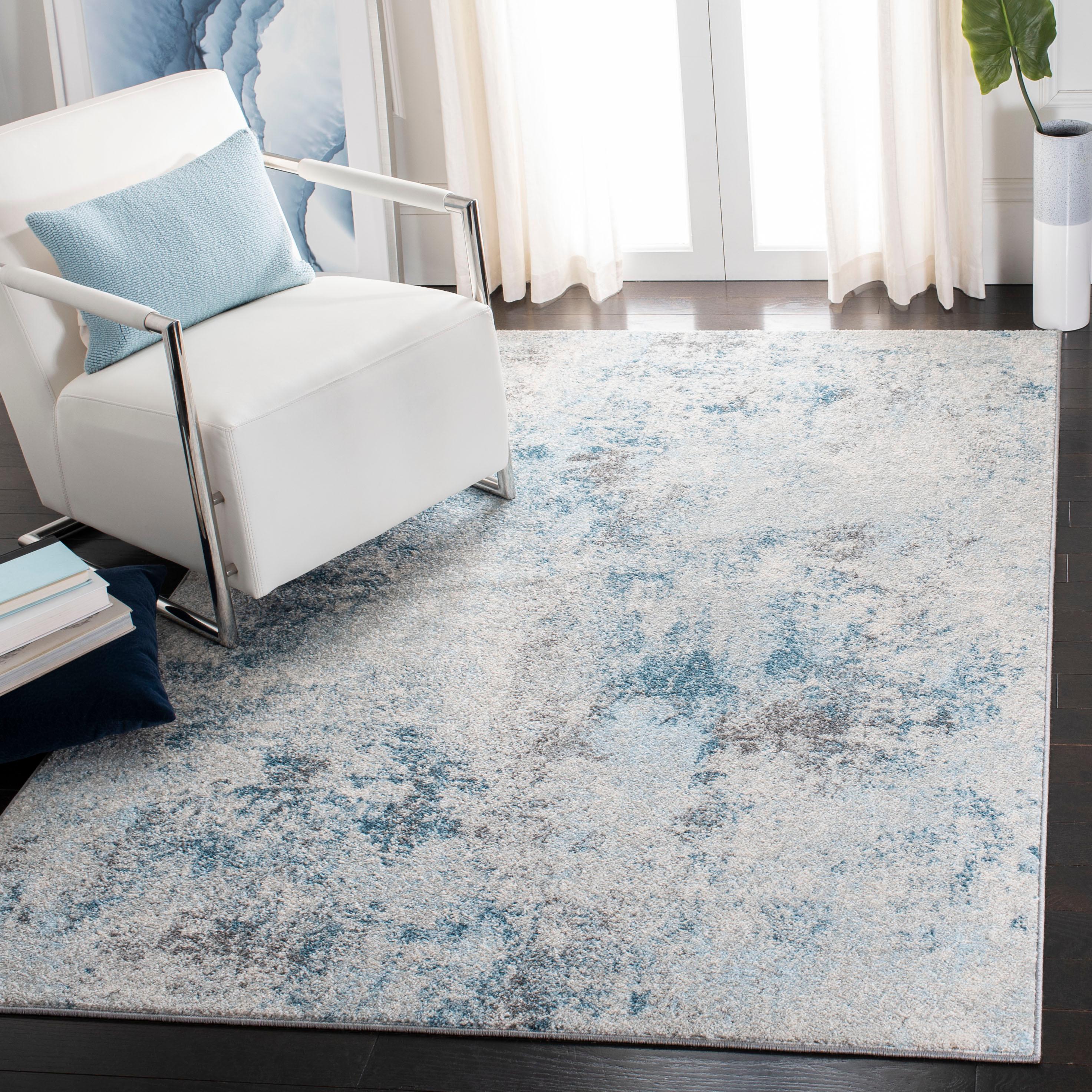 Ivory and Blue Synthetic Rectangular Rug, 10' x 13'