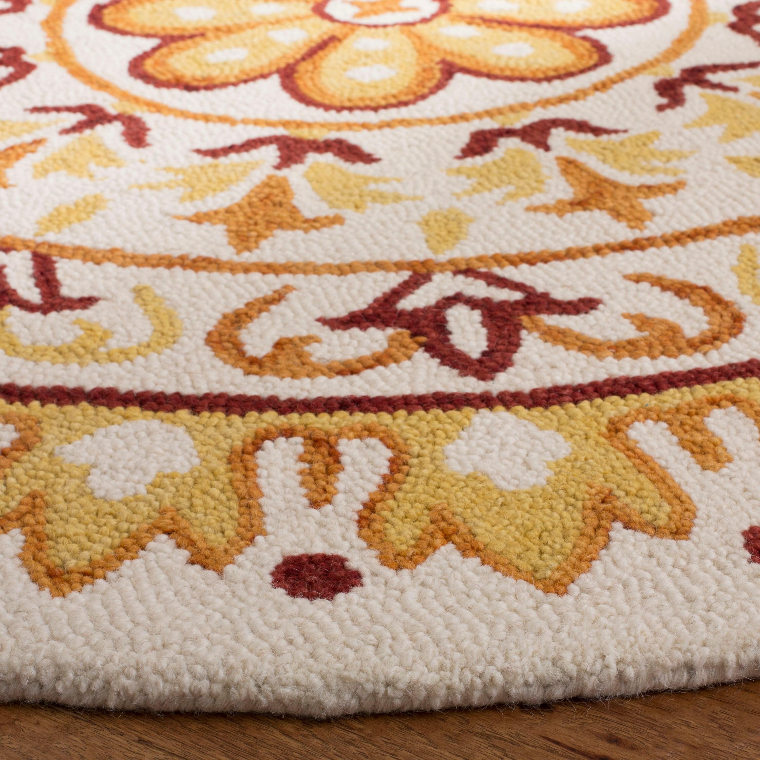 Novelty NOV607 Hand Tufted Area Rug - Ivory/Gold - 4' round - Safavieh.