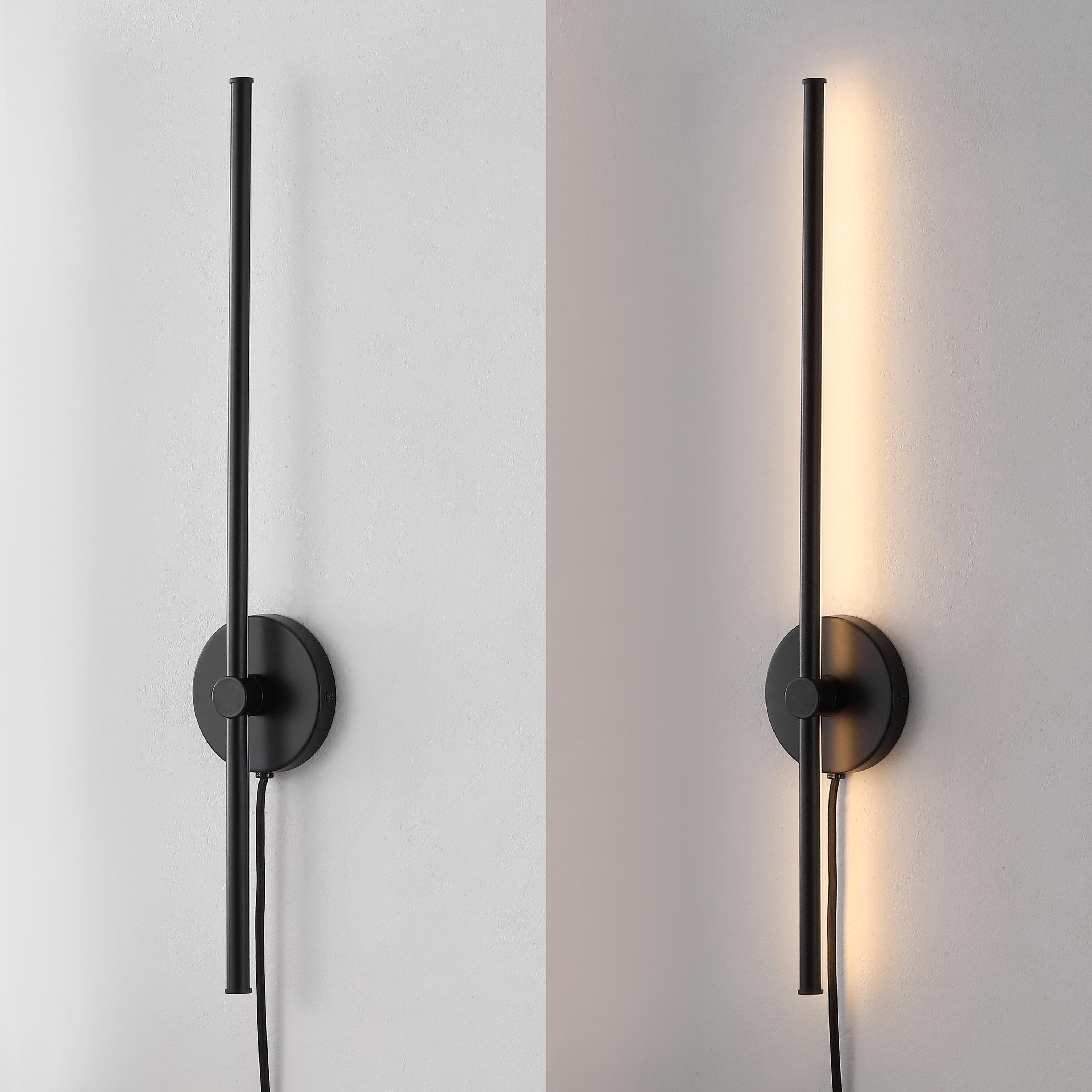 Anton 27.25 in. 1-Light Modern Minimalist Iron Adjustable Bar Integrated LED Plug-In Sconce, Black