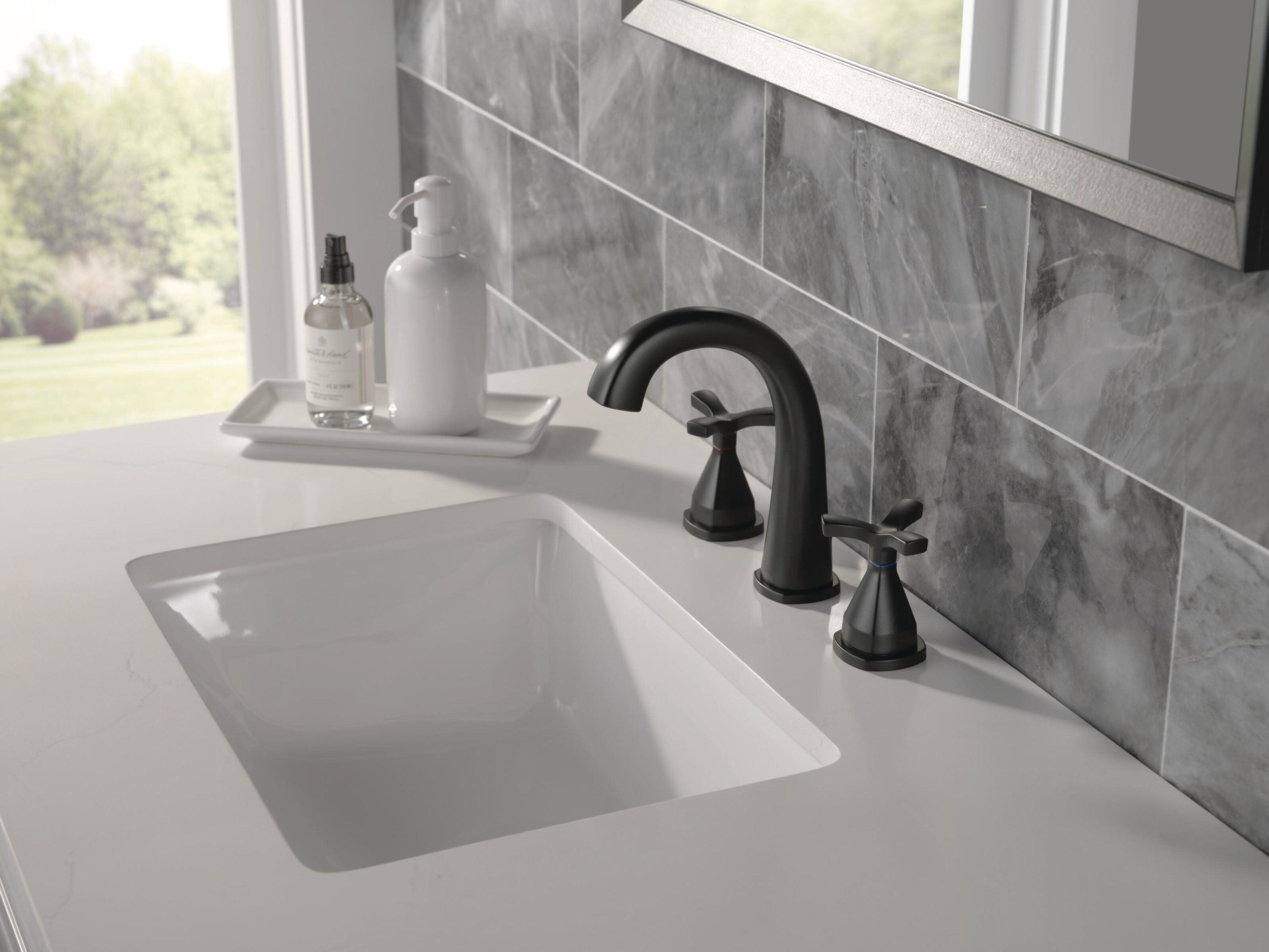 Stryke Widespread Bathroom Faucet with Drain Assembly and DIAMOND™ Seal Technology