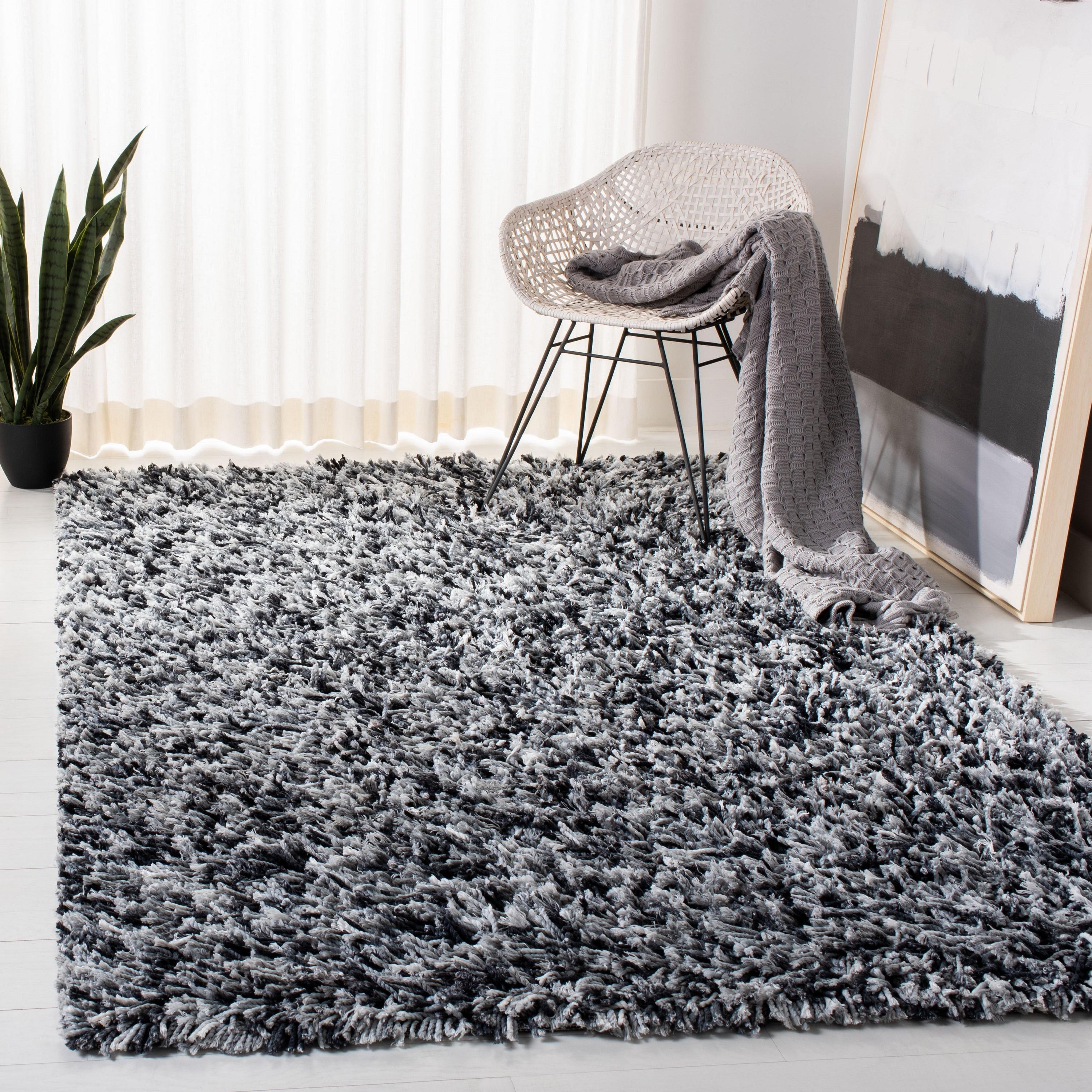 SAFAVIEH Rio Kynaston Solid Polyester Shag Area Rug, Black/Ivory, 6' x 9'