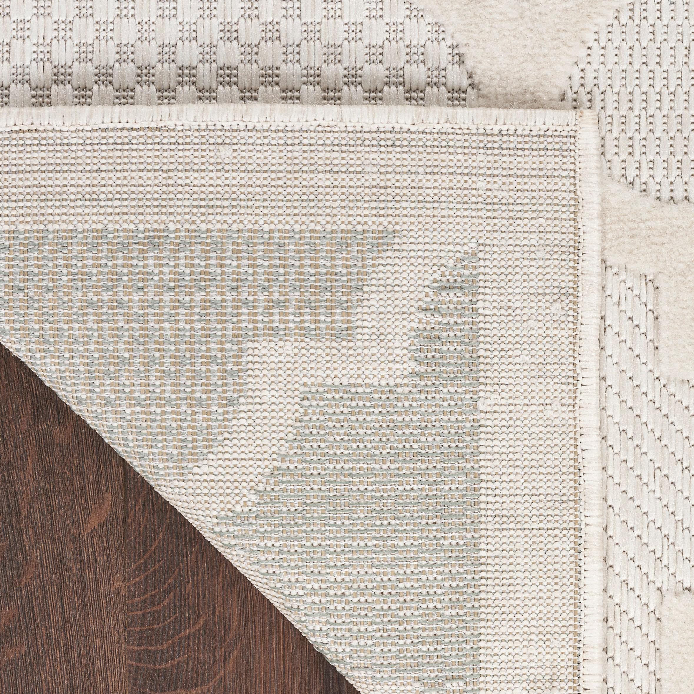 Nourison Easy Care 7' x 10' Ivory/White Indoor/Outdoor Rug
