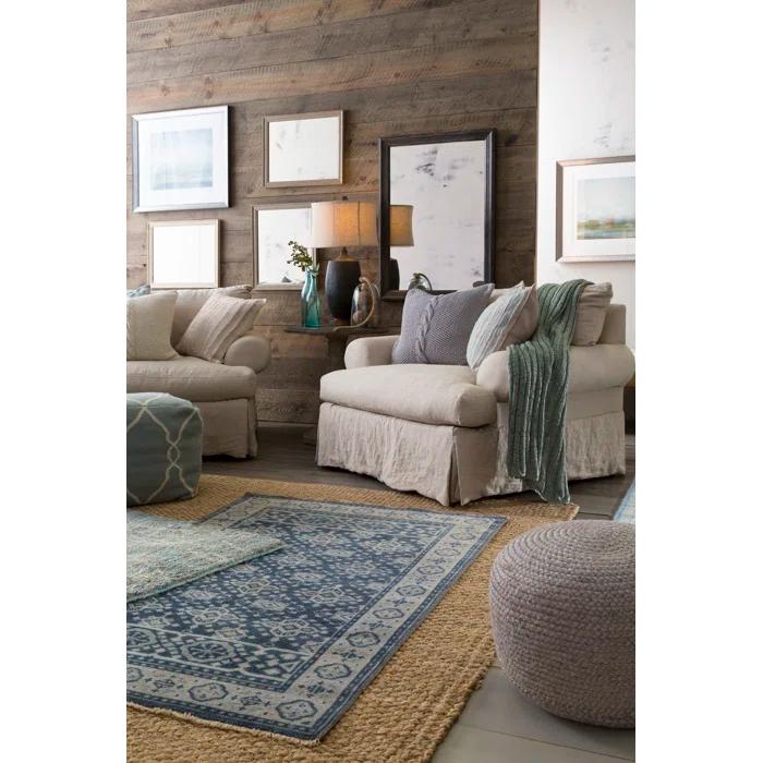 Rodriguez Upholstered Pouf