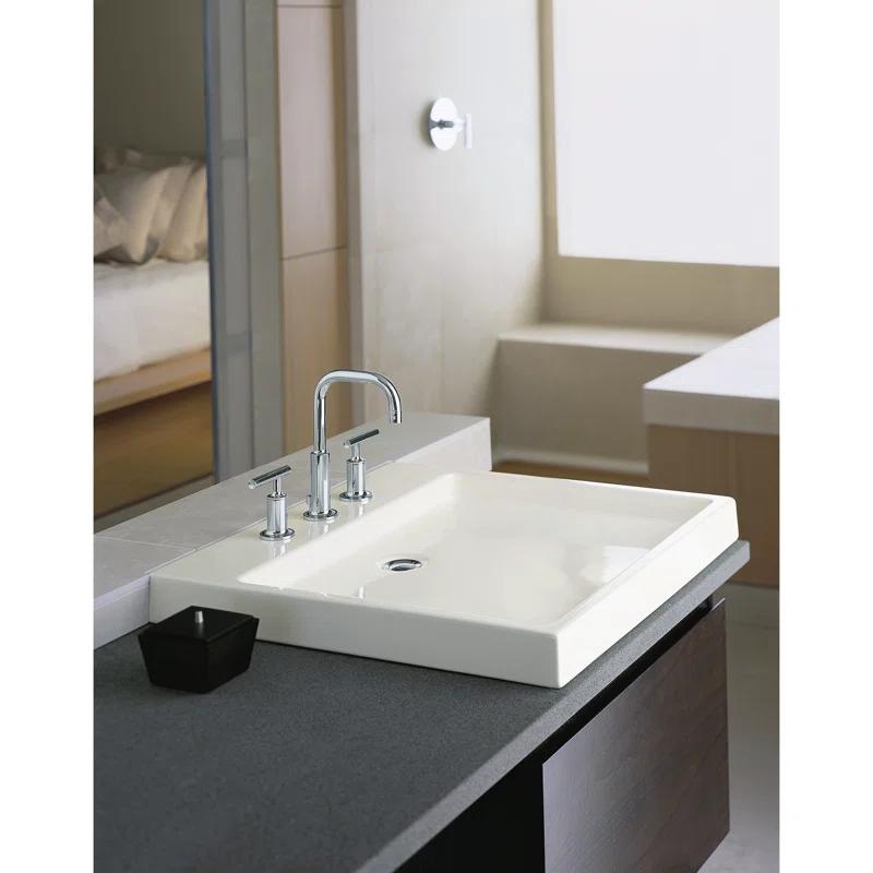 Purist® Widespread Faucet with Drain Assembly Low Lever Handles and Low Gooseneck Spout
