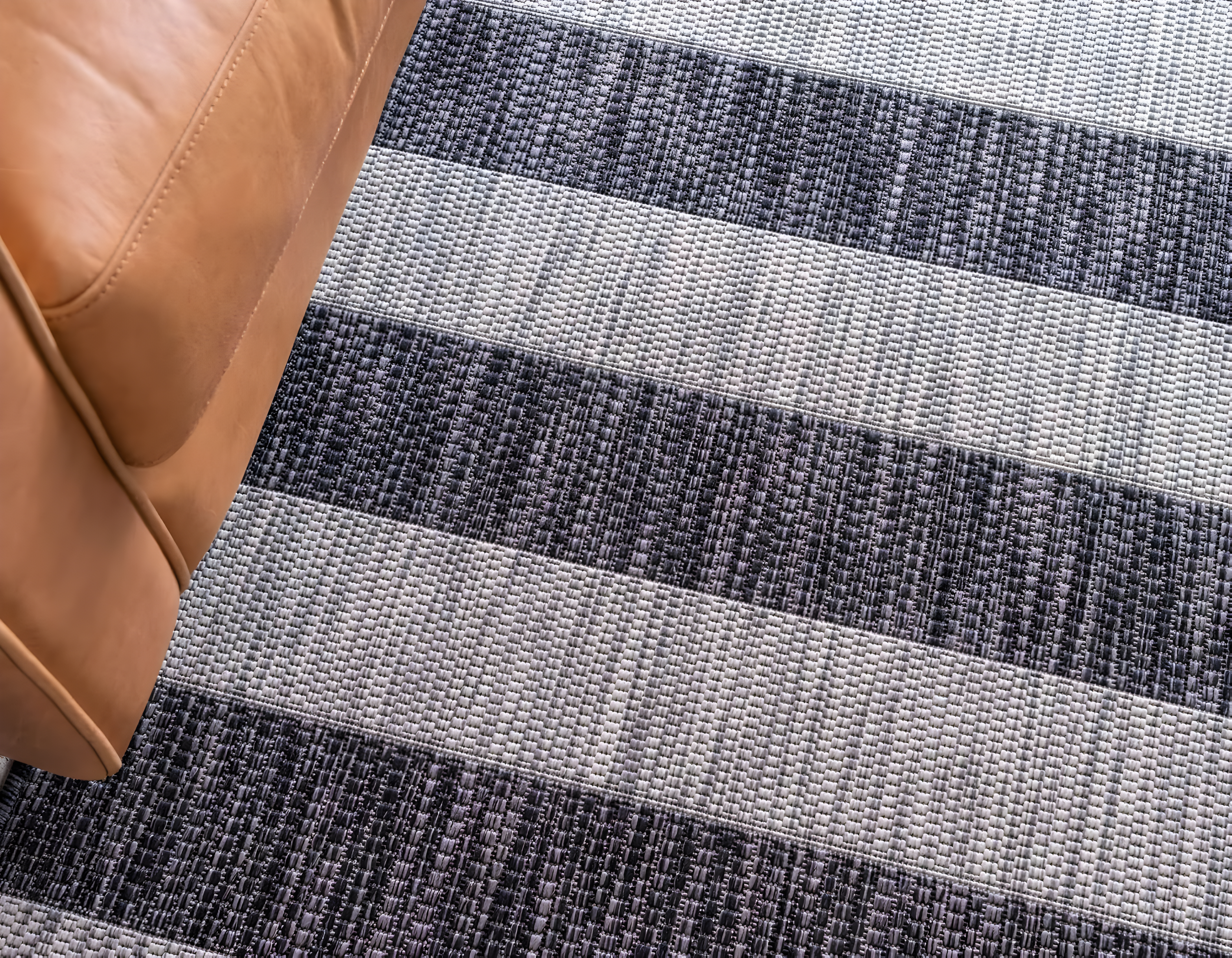 Charcoal Gray and Black Striped Synthetic Outdoor Rug 7' x 10'