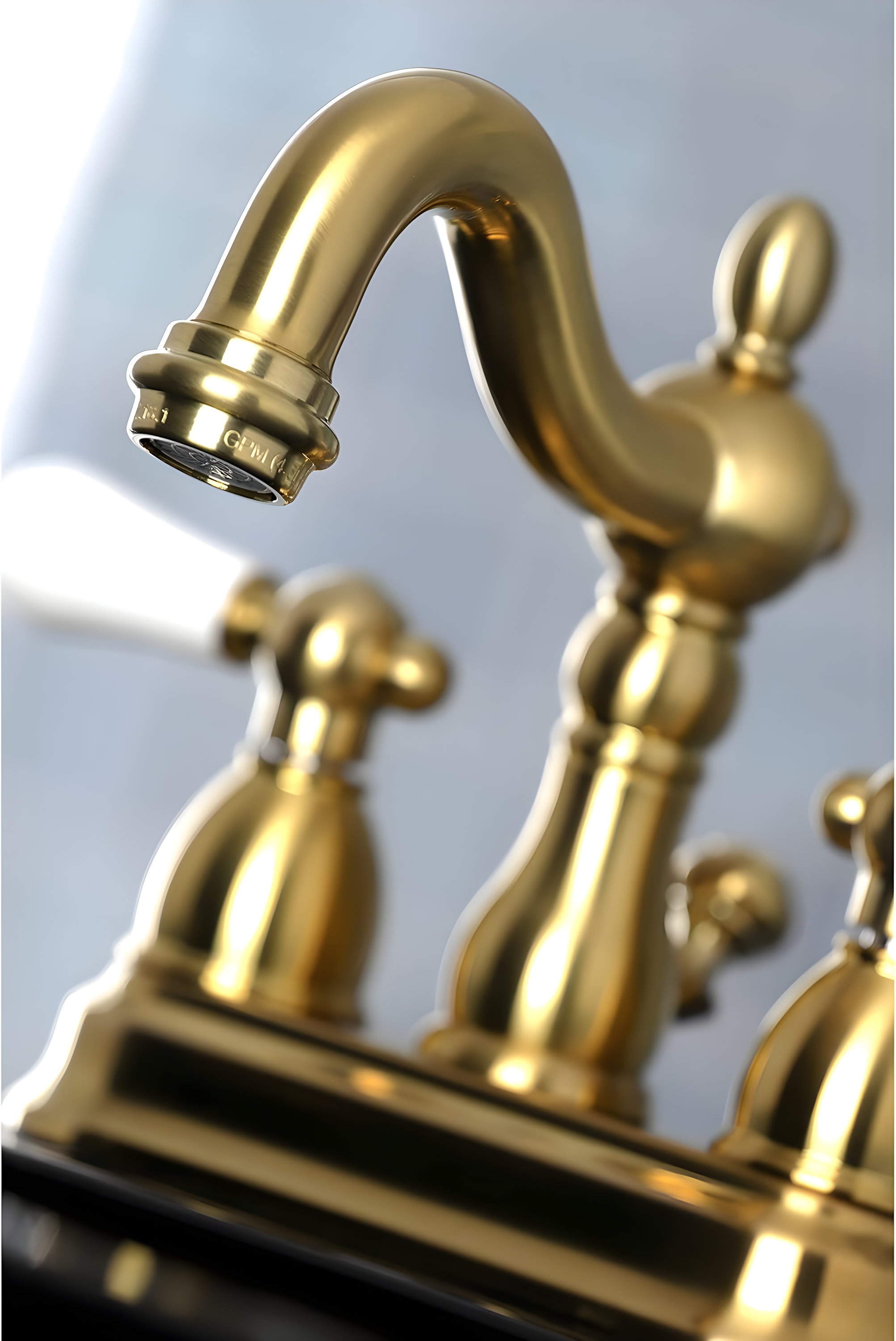 Kingston Brass Heritage Two-Handle 3-Hole Deck Mount 4" Centerset Bathroom Faucet with Plastic Pop-Up