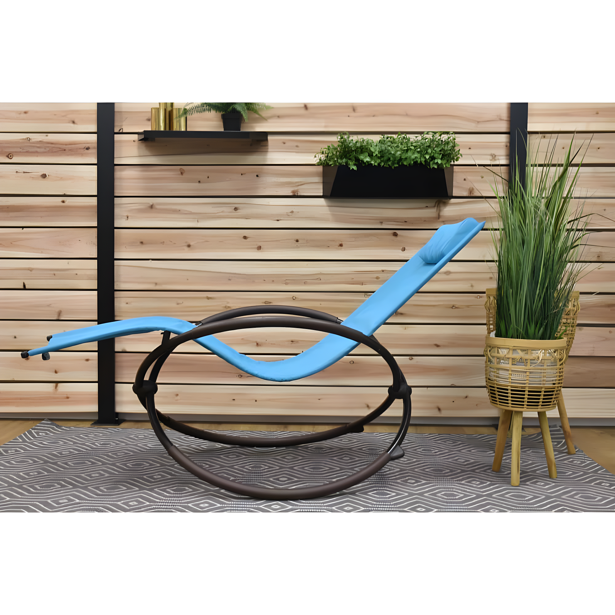 The Hamptons Collection 60” Blue Outdoor Aluminum Orbital Lounge Chair with a Pillow