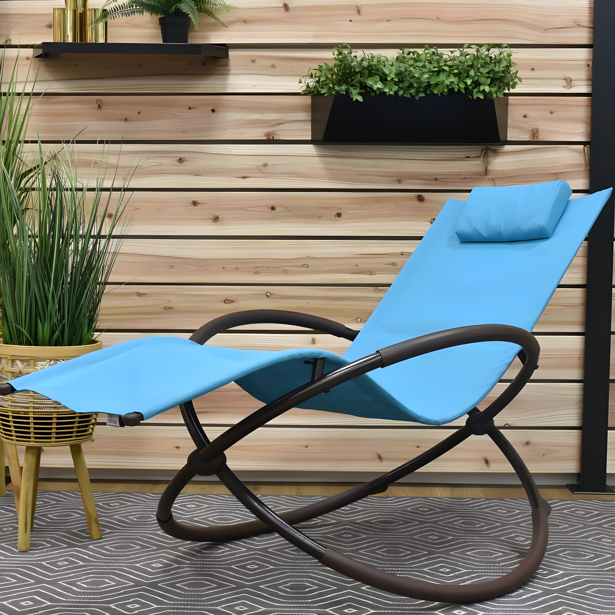 The Hamptons Collection 60” Blue Outdoor Aluminum Orbital Lounge Chair with a Pillow