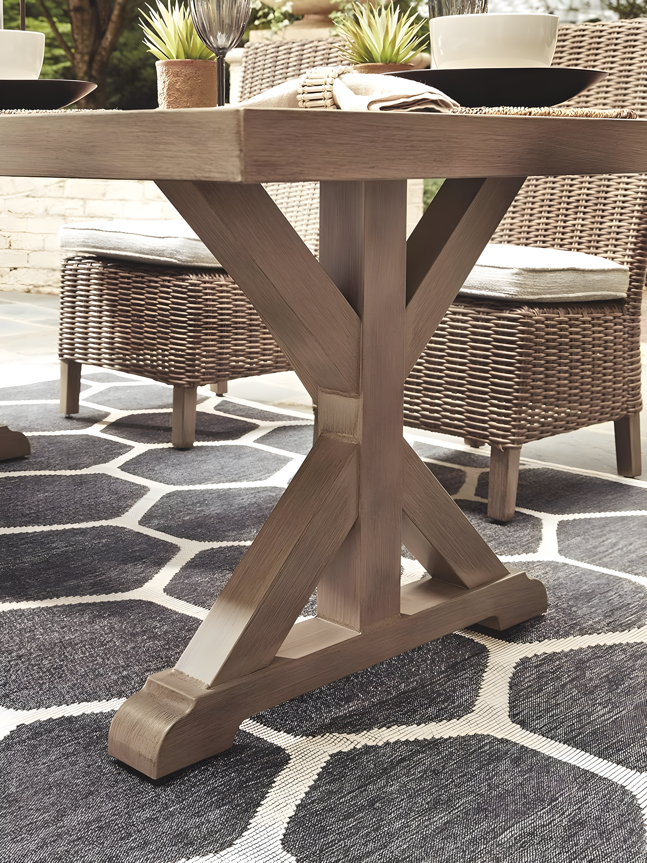 Signature Design by Ashley Beachcroft Trestle Patio Dining Table in Beige