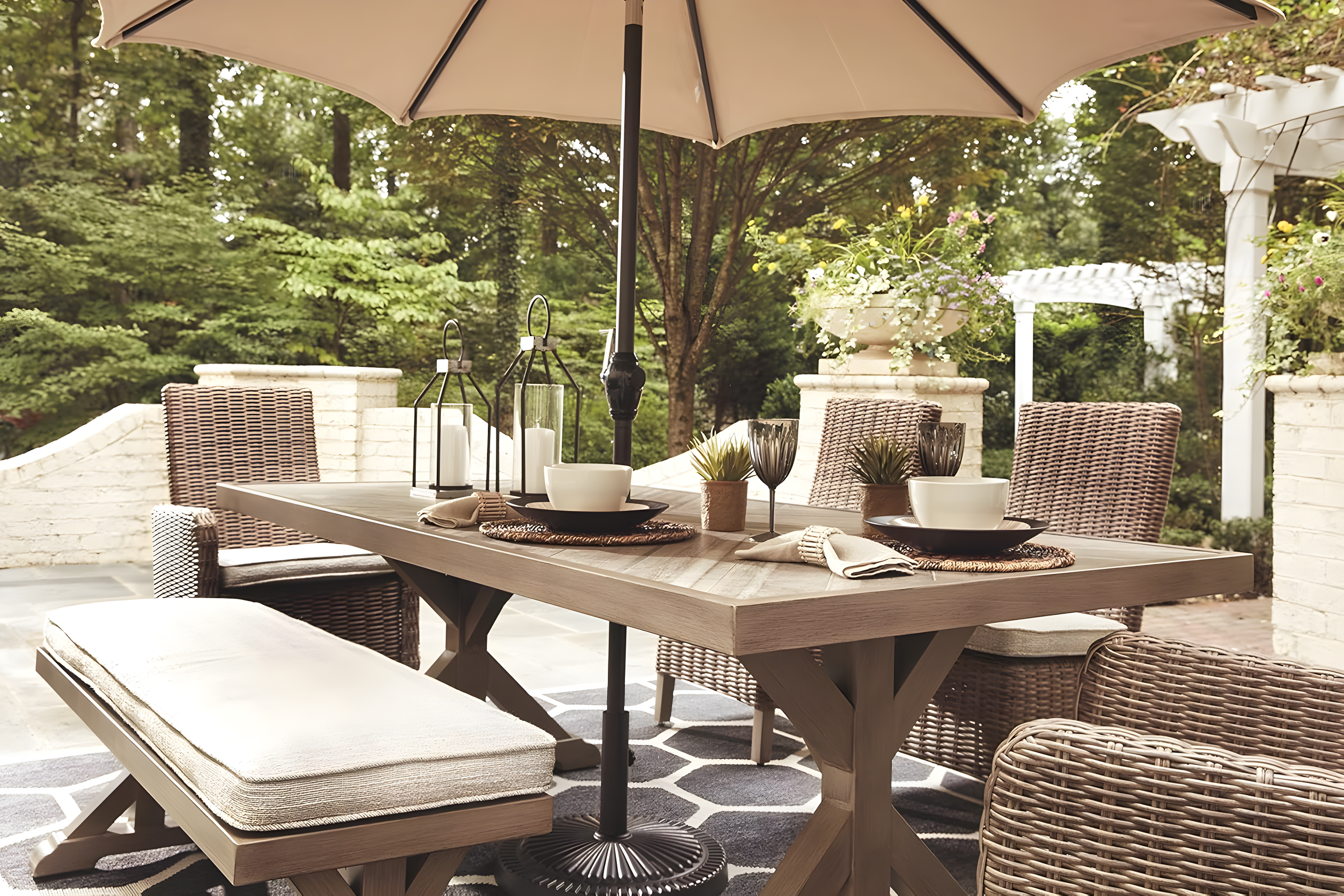 Signature Design by Ashley Beachcroft Trestle Patio Dining Table in Beige
