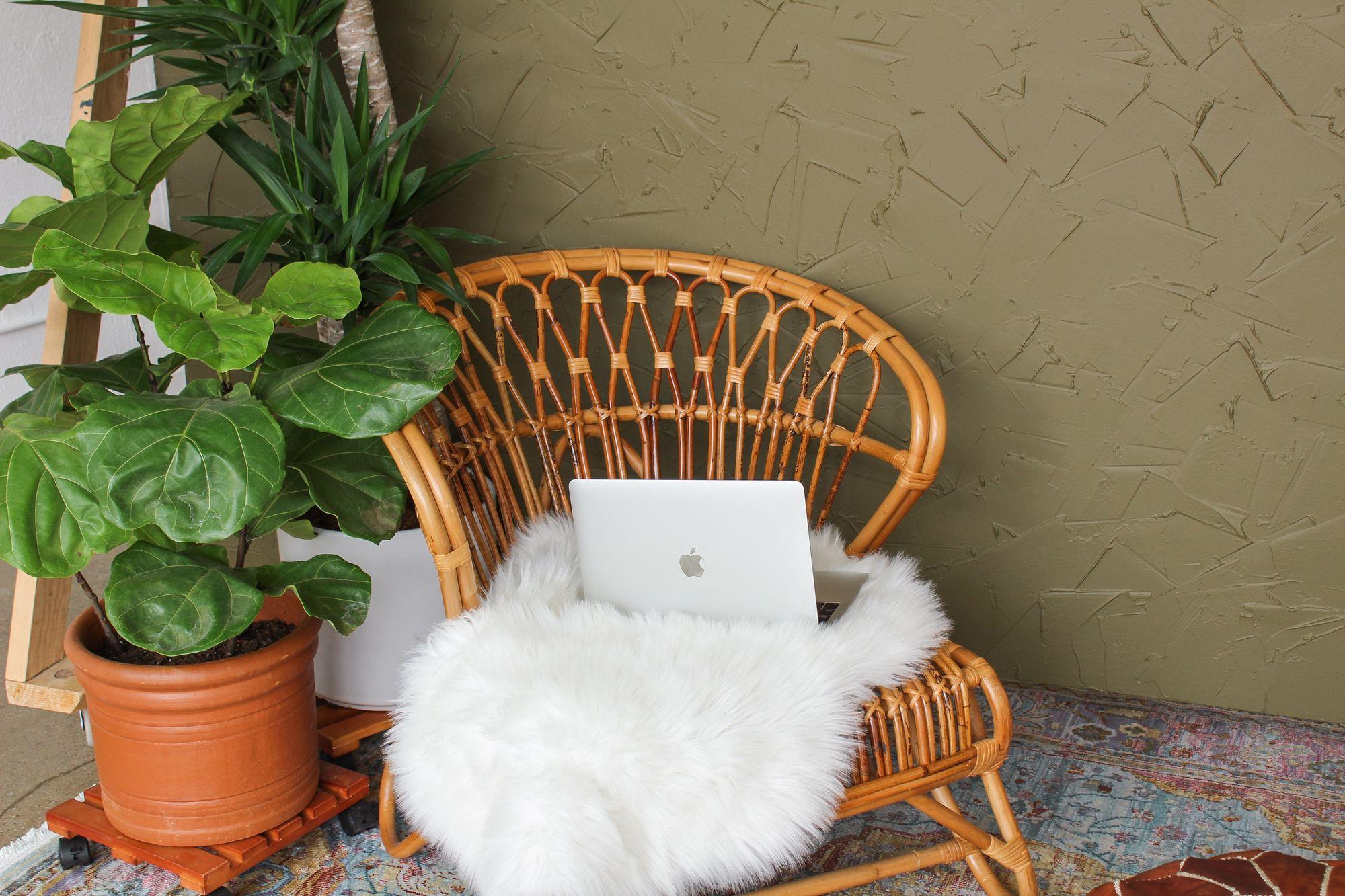 A cozy nook a with a high-quality rattan rocker.