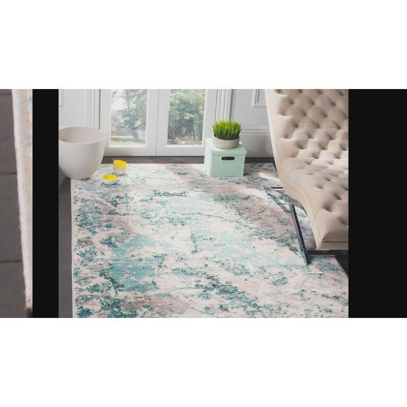 Ivory & Charcoal Abstract Synthetic 9' x 12' Easy-Care Area Rug