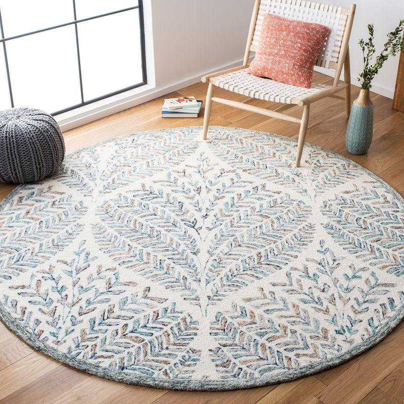 Capri Ivory and Blue Hand-Tufted Wool Round Area Rug