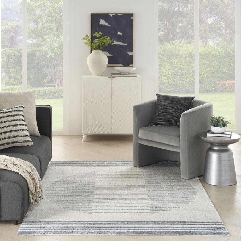Nourison Astra Machine Washable Stripe Circle Mid-Century Modern Indoor Rug Ivory Blue 5'3" x 7'