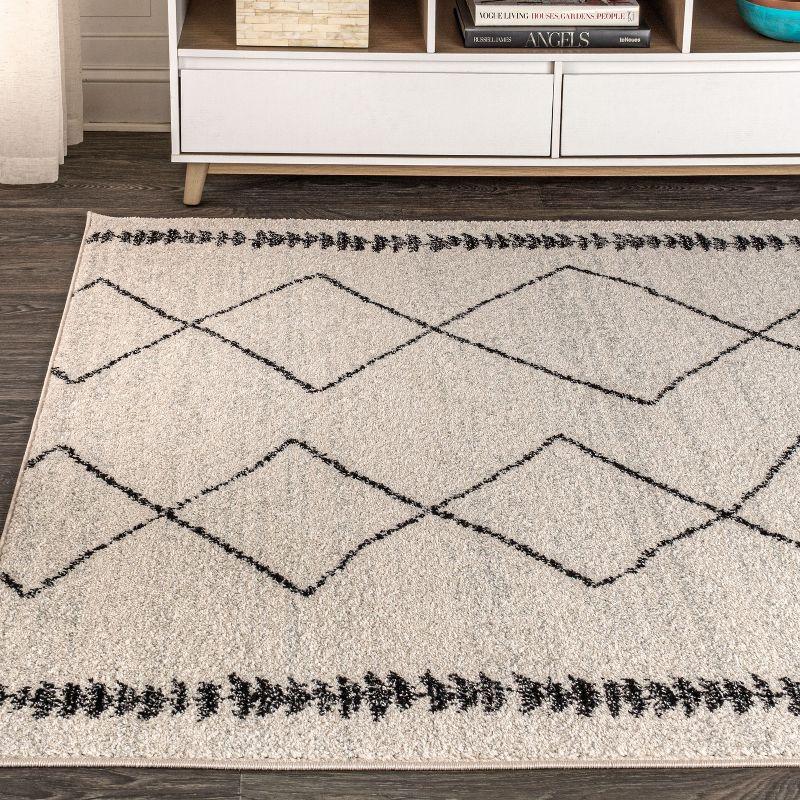 Zaina 8' x 10' Black and Cream Geometric Synthetic Area Rug