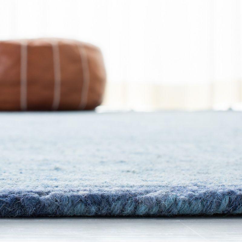 Ikat IKT506 Hand Tufted Area Rug - Blue - 5'x8' - Safavieh