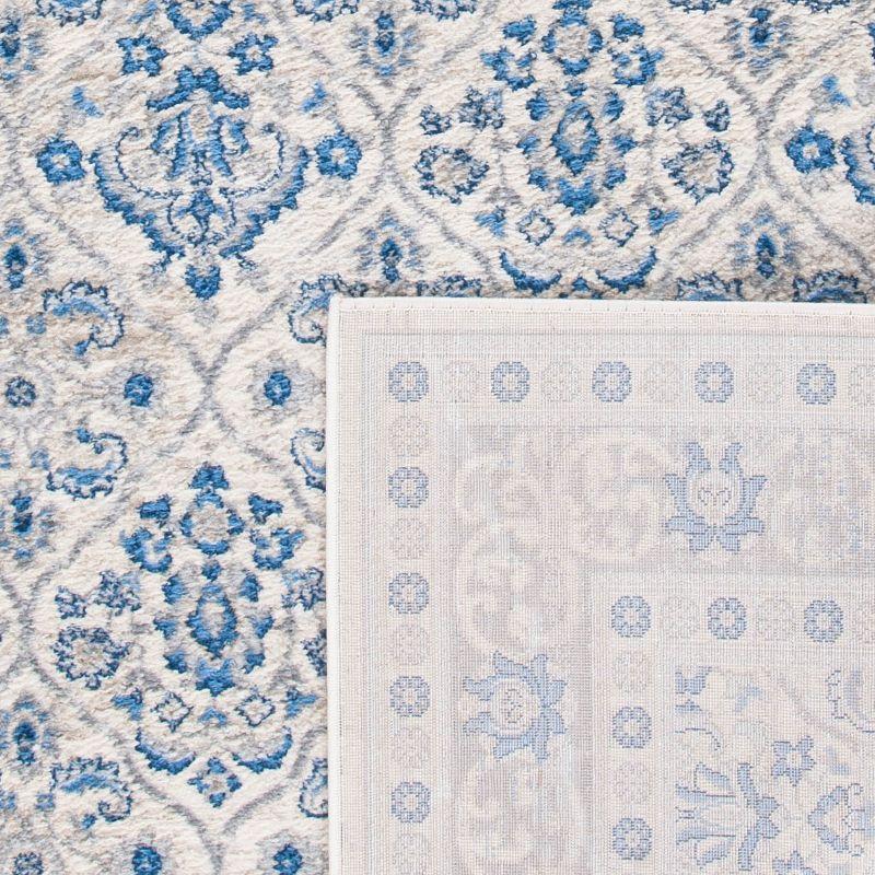 Ivory and Blue Hand-knotted Rectangular Synthetic Rug