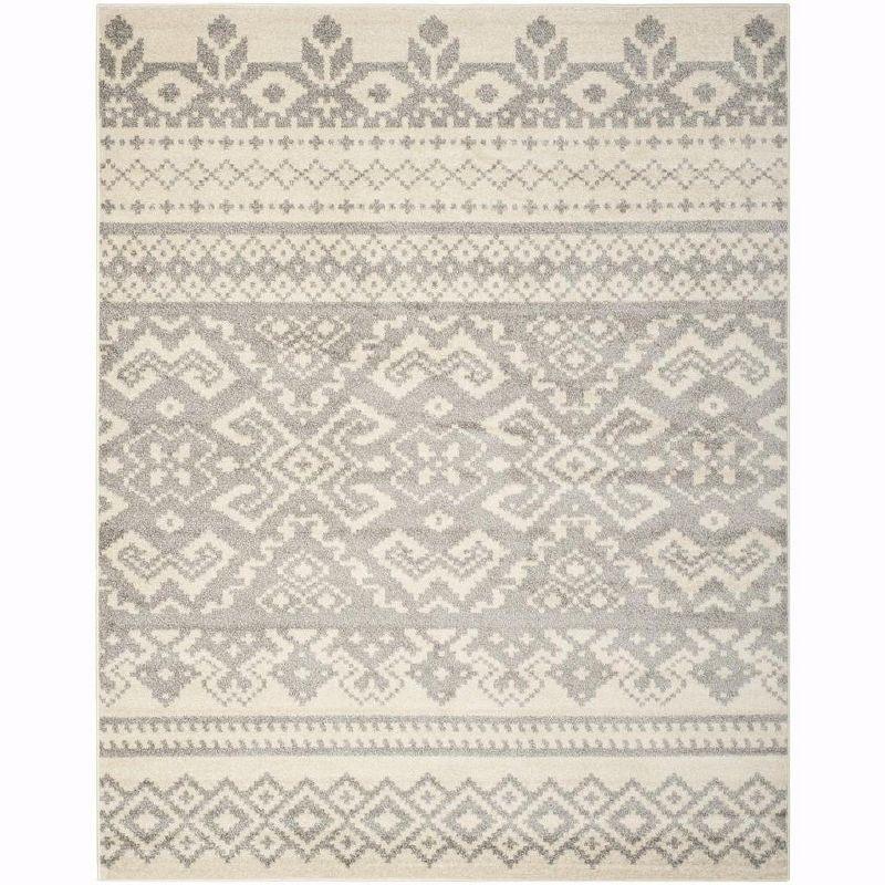 Chic Ivory & Silver Synthetic 10' x 14' Easy-Care Area Rug