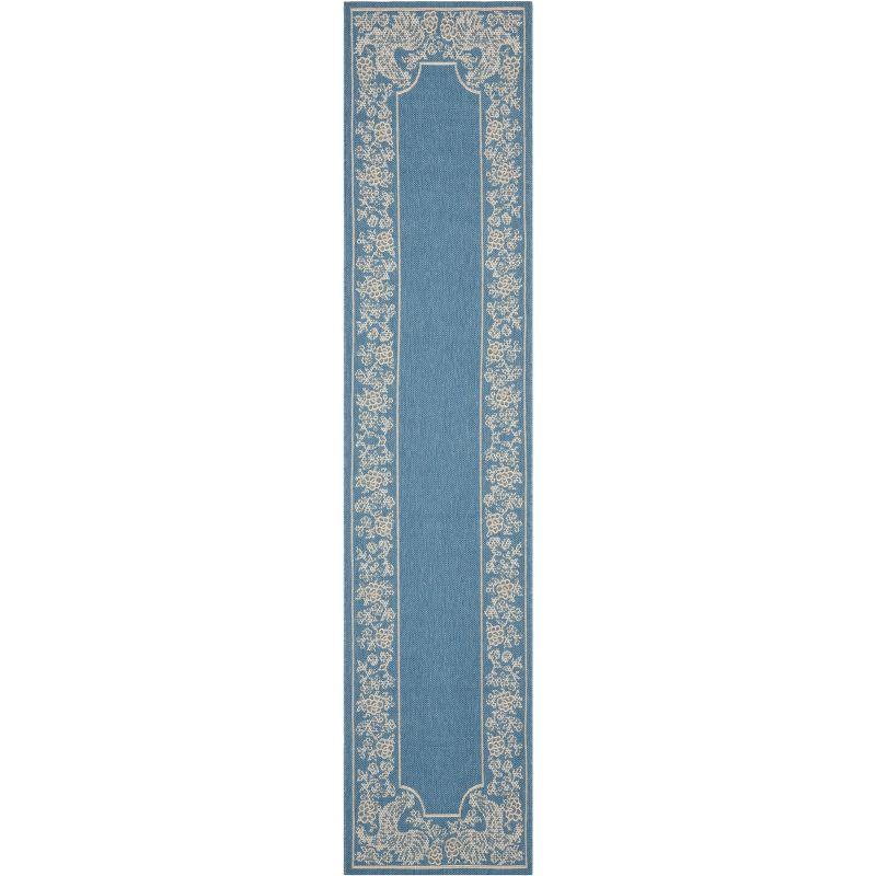 28" Blue and Natural Synthetic Reversible Flat Woven Rug