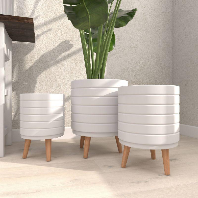 Cosmoliving By Cosmopolitan Set Of 3 White Wood Planter 14", 16", 18"H