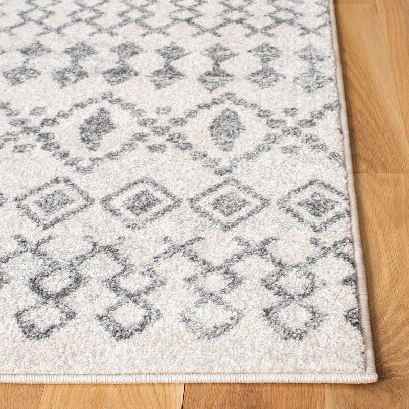 Ivory Geometric 4' x 6' Hand-Knotted Synthetic Area Rug