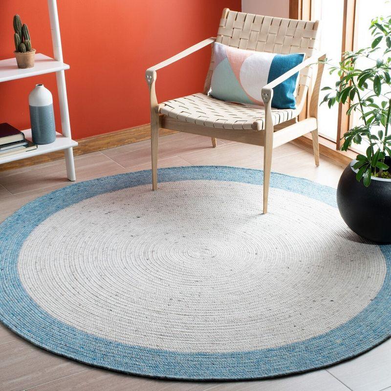 Ivory and Blue Round Braided Wool Area Rug