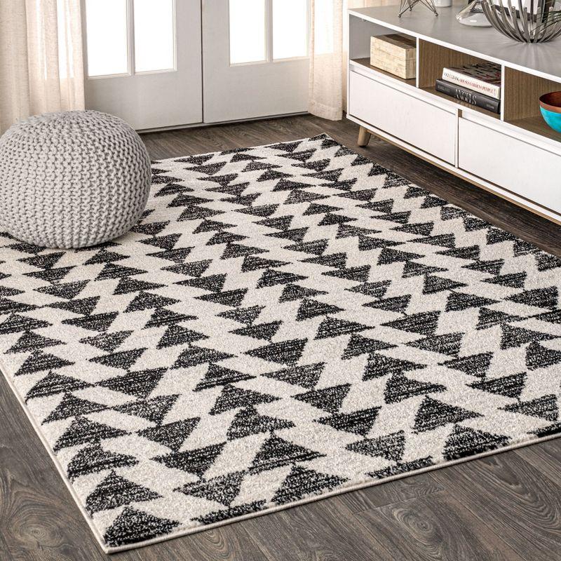 Aisha Cream and Black Geometric Synthetic Area Rug