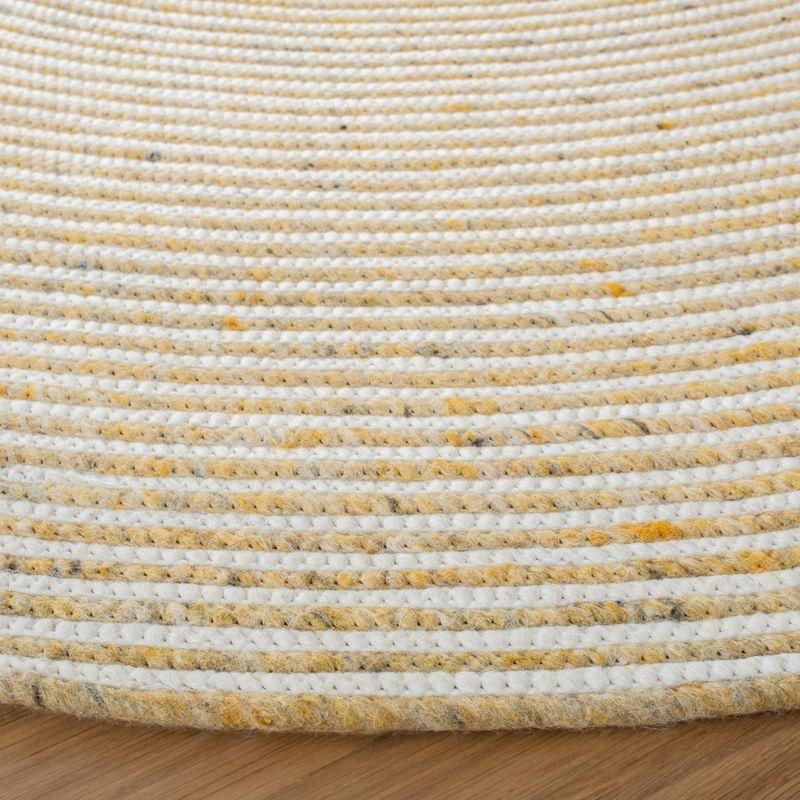 Braided BRD905 Hand Woven Area Rug - Gold/Ivory - 4' round - Safavieh.