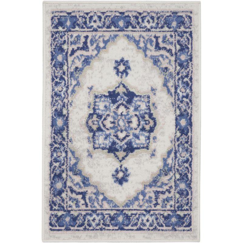 Ivory Blue Floral Synthetic 5' x 7' Reversible Area Rug