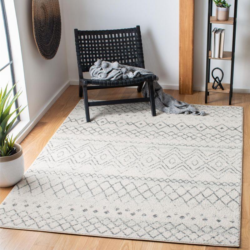 Ivory and Charcoal Hand-Knotted Synthetic Easy-Care Area Rug