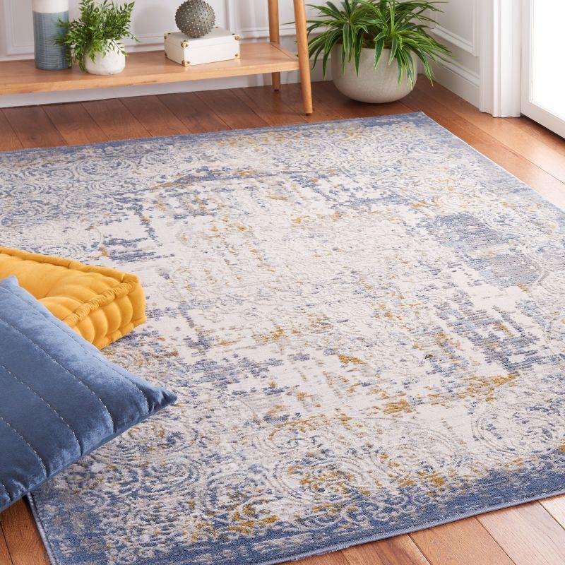 Palma Blue and Beige Rectangular Synthetic Area Rug 4' x 6'