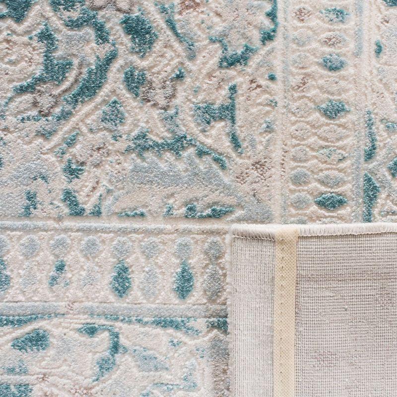 Ivory and Turquoise Hand-knotted Synthetic Rectangular Rug