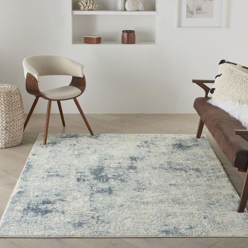 Ivory Blue Abstract 6'6" x 9'6" Area Rug